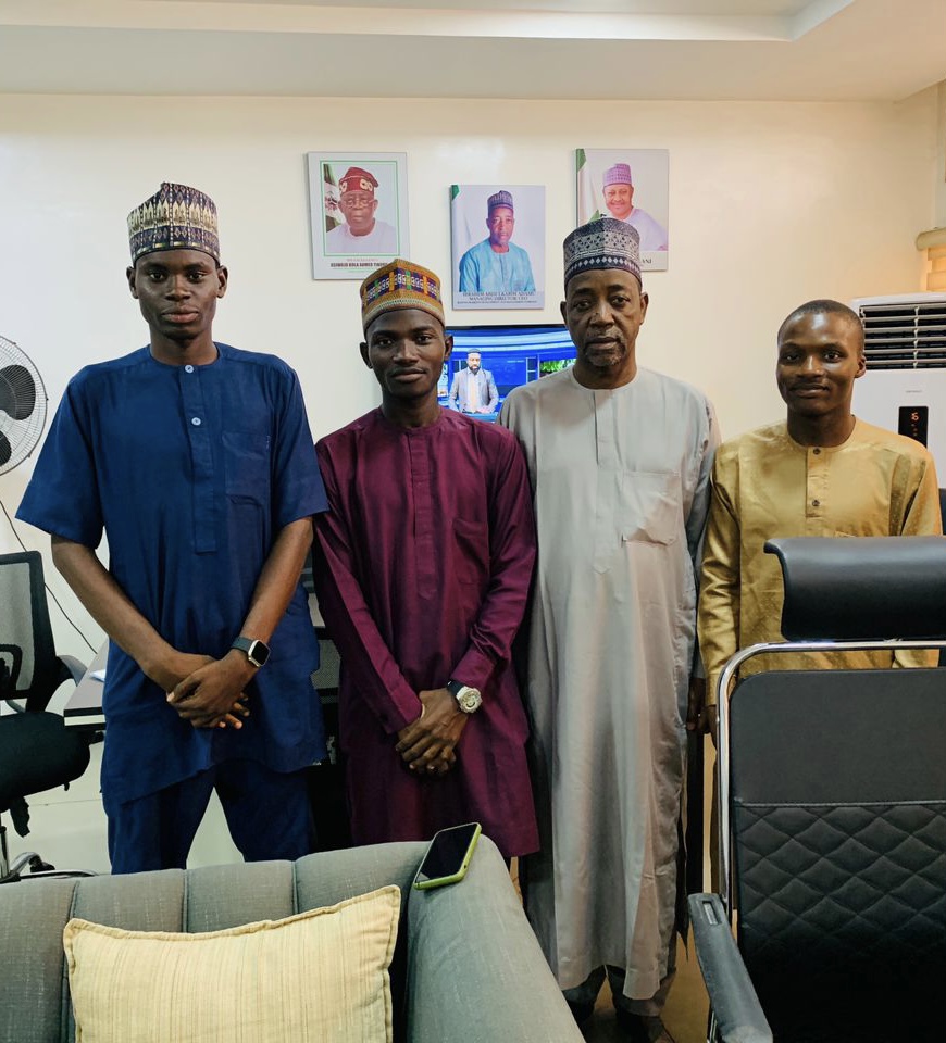 KYEN representatives with a summit partner